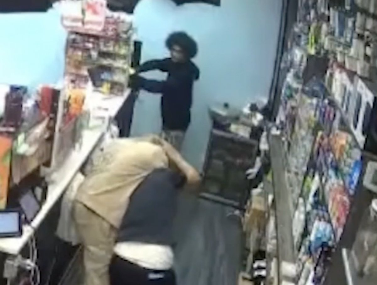 Exclusive video shows workers fighting off thieves during deli robbery